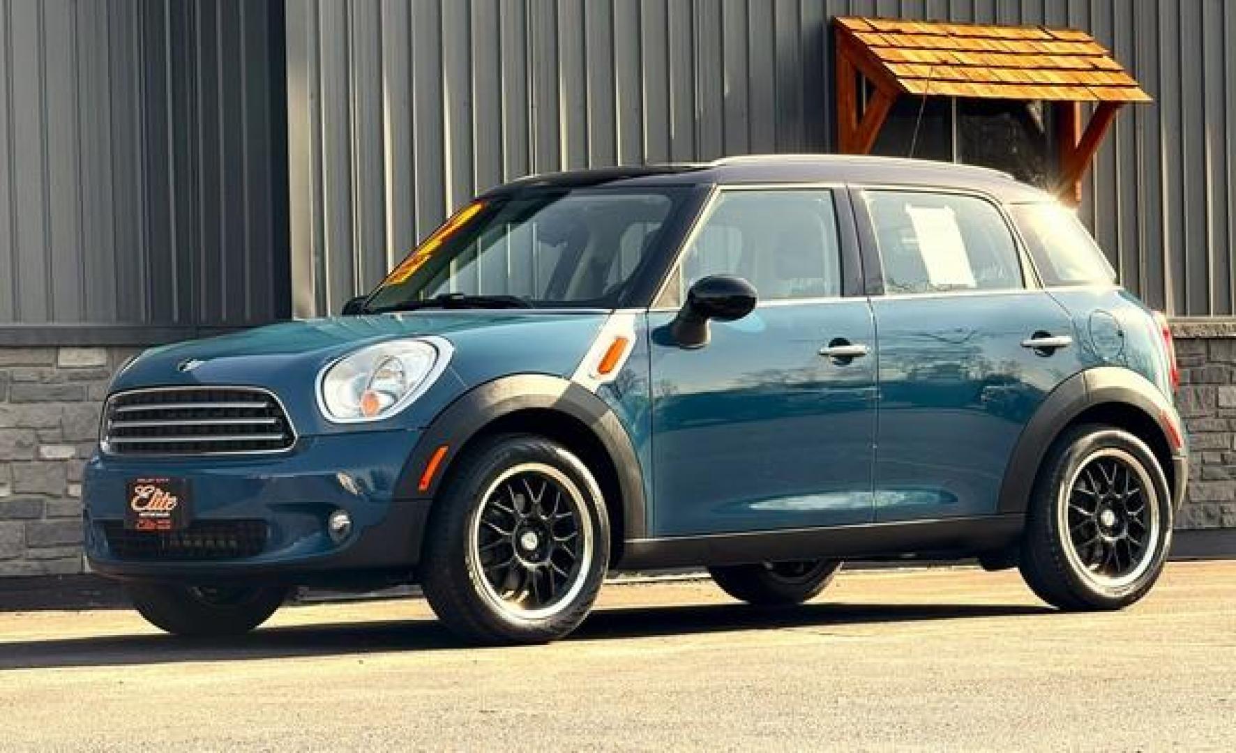 2012 BLUE MINI COOPER COUNTRYMAN (WMWZB3C54CW) with an L4,1.6L(98 CID),DOHC engine, AUTOMATIC transmission, located at 14600 Frazho Road, Warren, MI, 48089, (586) 776-3400, 42.485996, -82.974220 - Photo#4