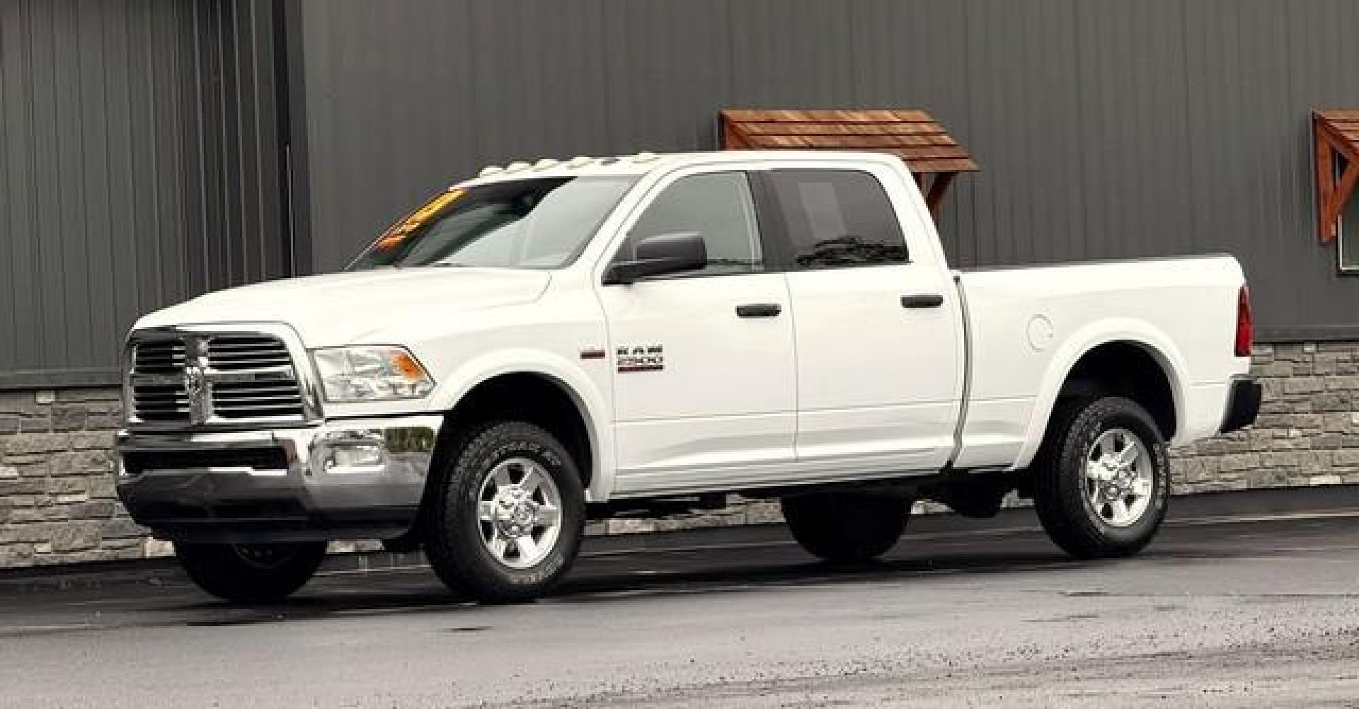 2013 WHITE RAM 2500 (3C6TR5DT8DG) with an V8,5.7L(345 CID),OHV engine, AUTOMATIC transmission, located at 14600 Frazho Road, Warren, MI, 48089, (586) 776-3400, 42.485996, -82.974220 - Photo#2
