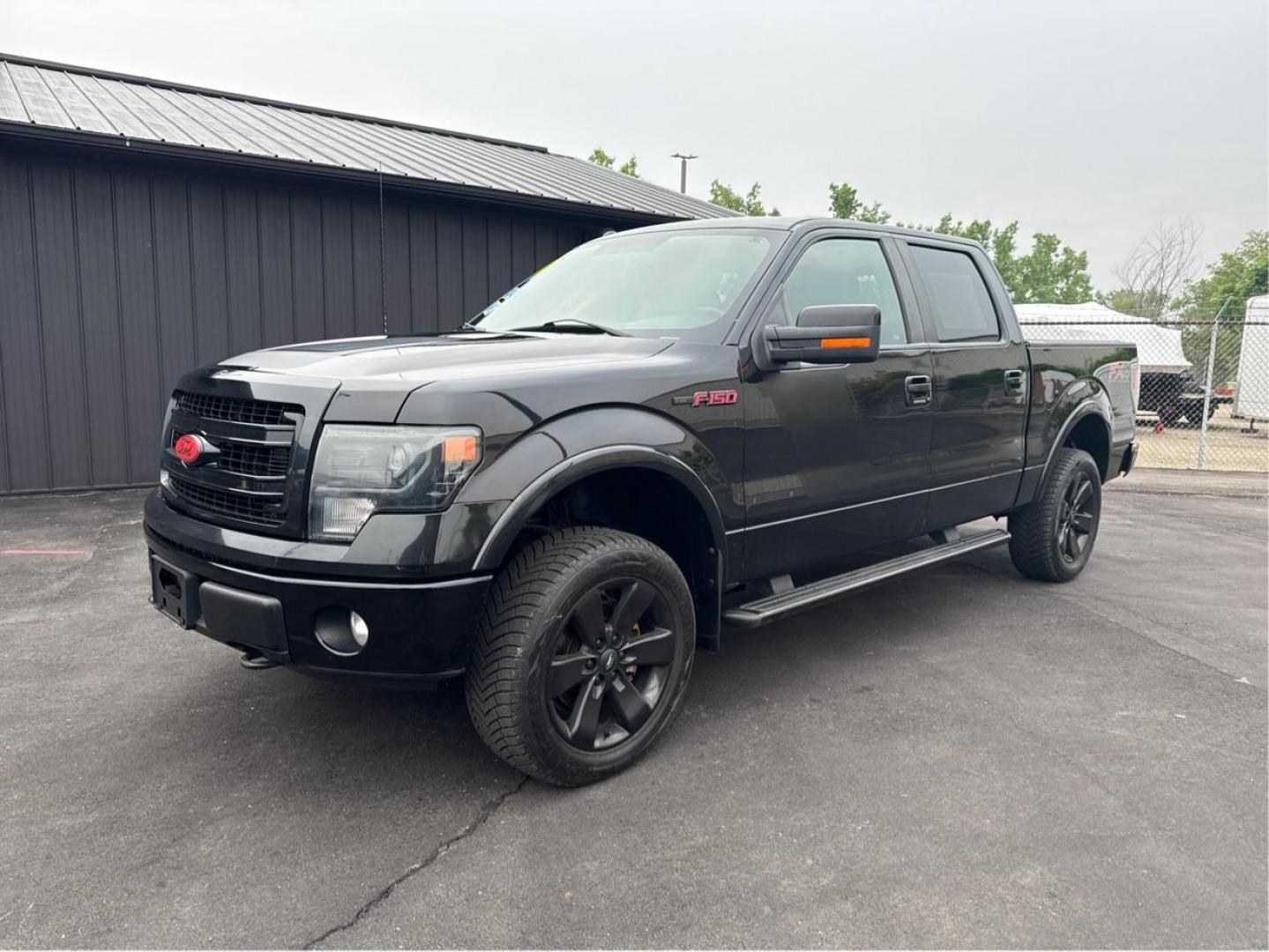 2014 BLACK FORD F-150 (1FTFW1EF7EF) with an V8,5.0L(302 CID),DOHC engine, AUTOMATIC transmission, located at 14600 Frazho Road, Warren, MI, 48089, (586) 776-3400, 42.485996, -82.974220 - Photo#0