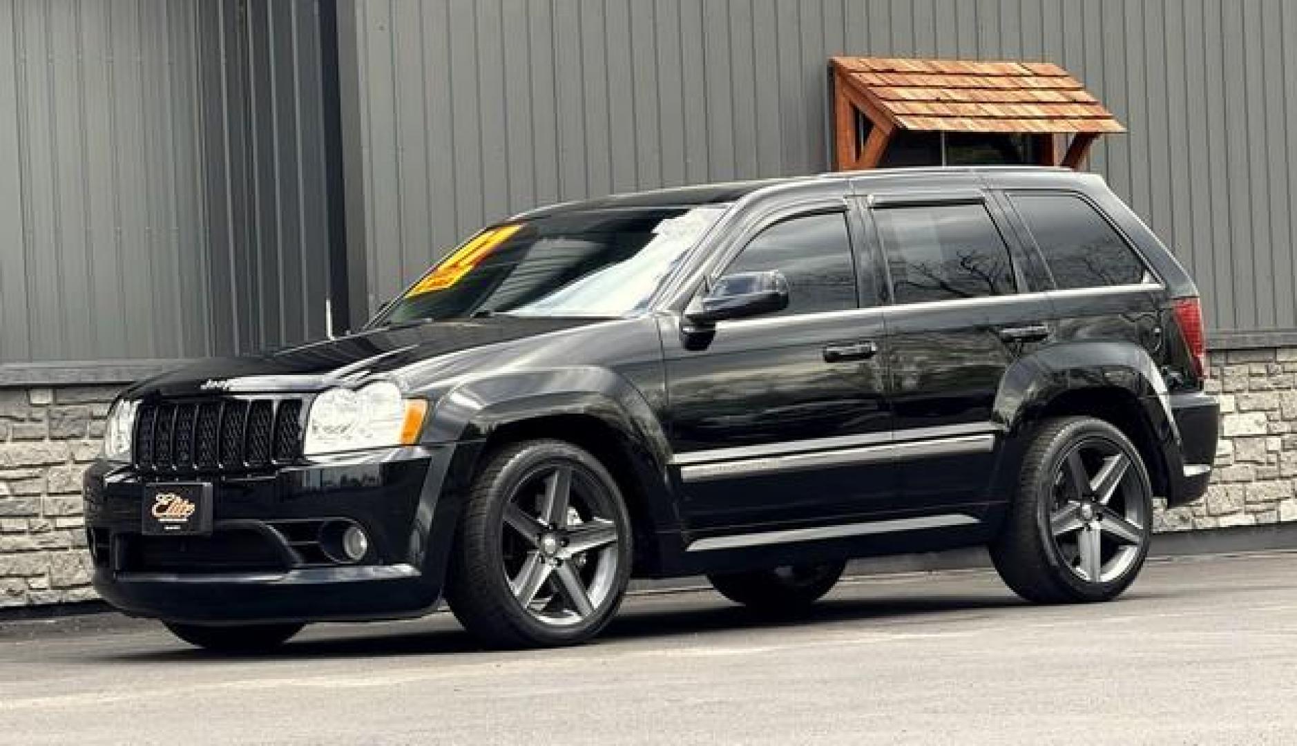 2007 BLACK JEEP GRAND CHEROKEE (1J8HR78357C) with an V8,6.1L(370 CID),OHV engine, AUTOMATIC transmission, located at 14600 Frazho Road, Warren, MI, 48089, (586) 776-3400, 42.485996, -82.974220 - Photo#1