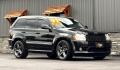 2007 BLACK JEEP GRAND CHEROKEE (1J8HR78357C) with an V8,6.1L(370 CID),OHV engine, AUTOMATIC transmission, located at 14600 Frazho Road, Warren, MI, 48089, (586) 776-3400, 42.485996, -82.974220 - Photo#2