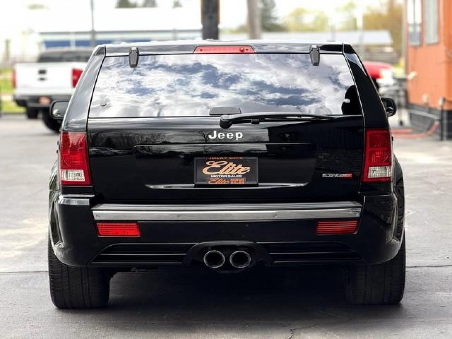 2007 BLACK JEEP GRAND CHEROKEE (1J8HR78357C) with an V8,6.1L(370 CID),OHV engine, AUTOMATIC transmission, located at 14600 Frazho Road, Warren, MI, 48089, (586) 776-3400, 42.485996, -82.974220 - Photo#6