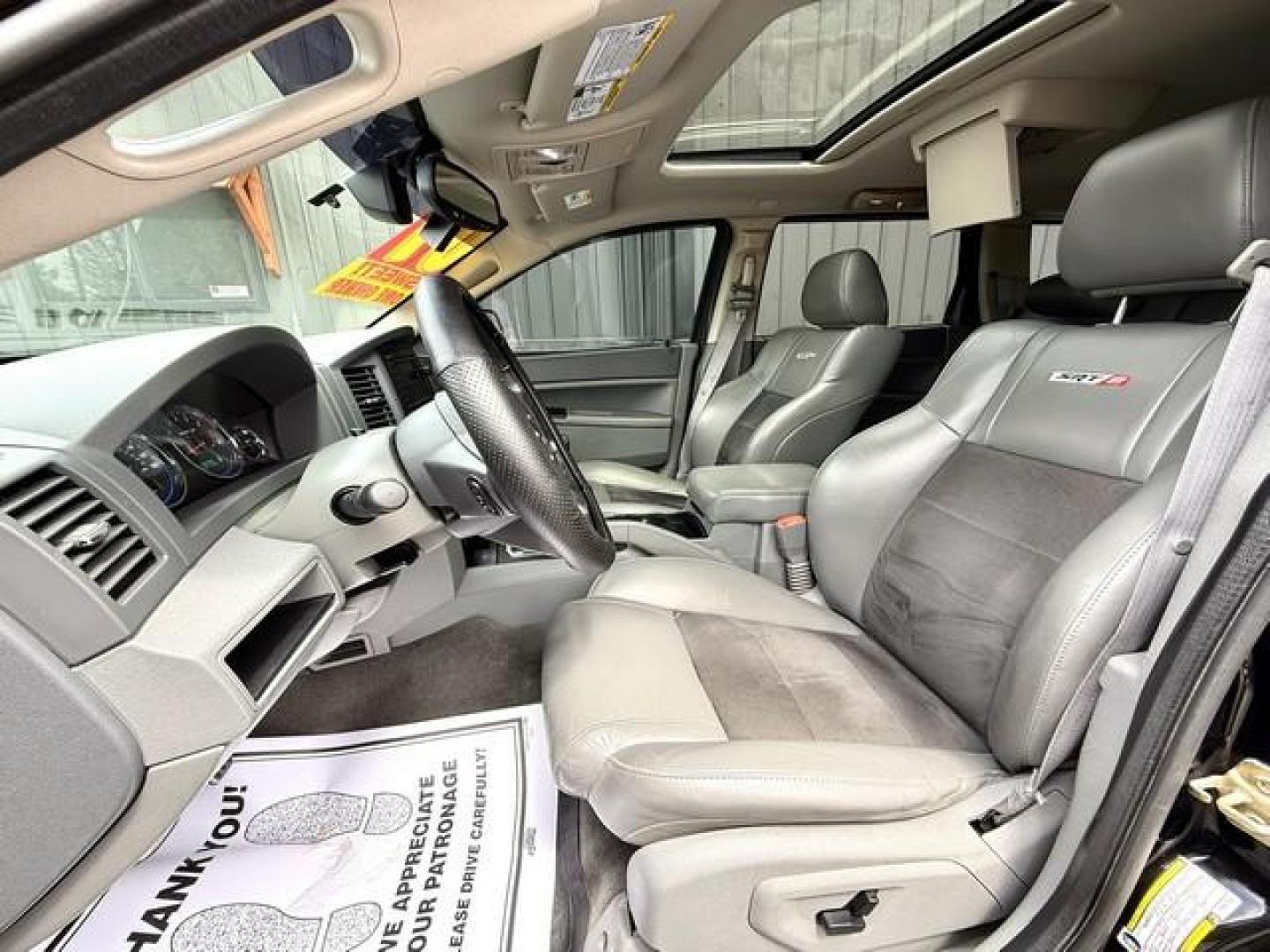 2007 BLACK JEEP GRAND CHEROKEE (1J8HR78357C) with an V8,6.1L(370 CID),OHV engine, AUTOMATIC transmission, located at 14600 Frazho Road, Warren, MI, 48089, (586) 776-3400, 42.485996, -82.974220 - Photo#9