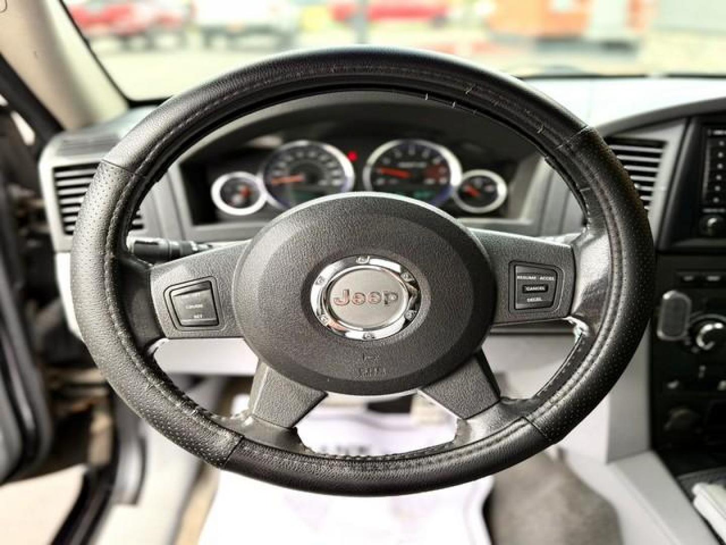 2007 BLACK JEEP GRAND CHEROKEE (1J8HR78357C) with an V8,6.1L(370 CID),OHV engine, AUTOMATIC transmission, located at 14600 Frazho Road, Warren, MI, 48089, (586) 776-3400, 42.485996, -82.974220 - Photo#14
