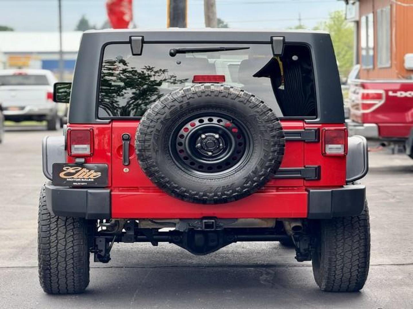 2016 RED JEEP WRANGLER (1C4BJWEG8GL) with an V6,3.6L(220 CID),DOHC engine, AUTOMATIC transmission, located at 14600 Frazho Road, Warren, MI, 48089, (586) 776-3400, 42.485996, -82.974220 - Photo#5