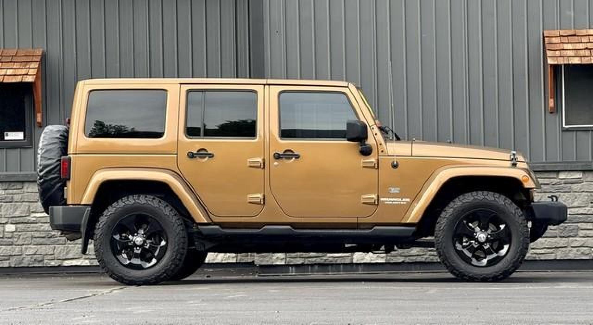 2011 BRONZE JEEP WRANGLER (1J4BA7H19BL) with an V6,3.8L(230 CID),OHV engine, AUTOMATIC transmission, located at 14600 Frazho Road, Warren, MI, 48089, (586) 776-3400, 42.485996, -82.974220 - Photo#4