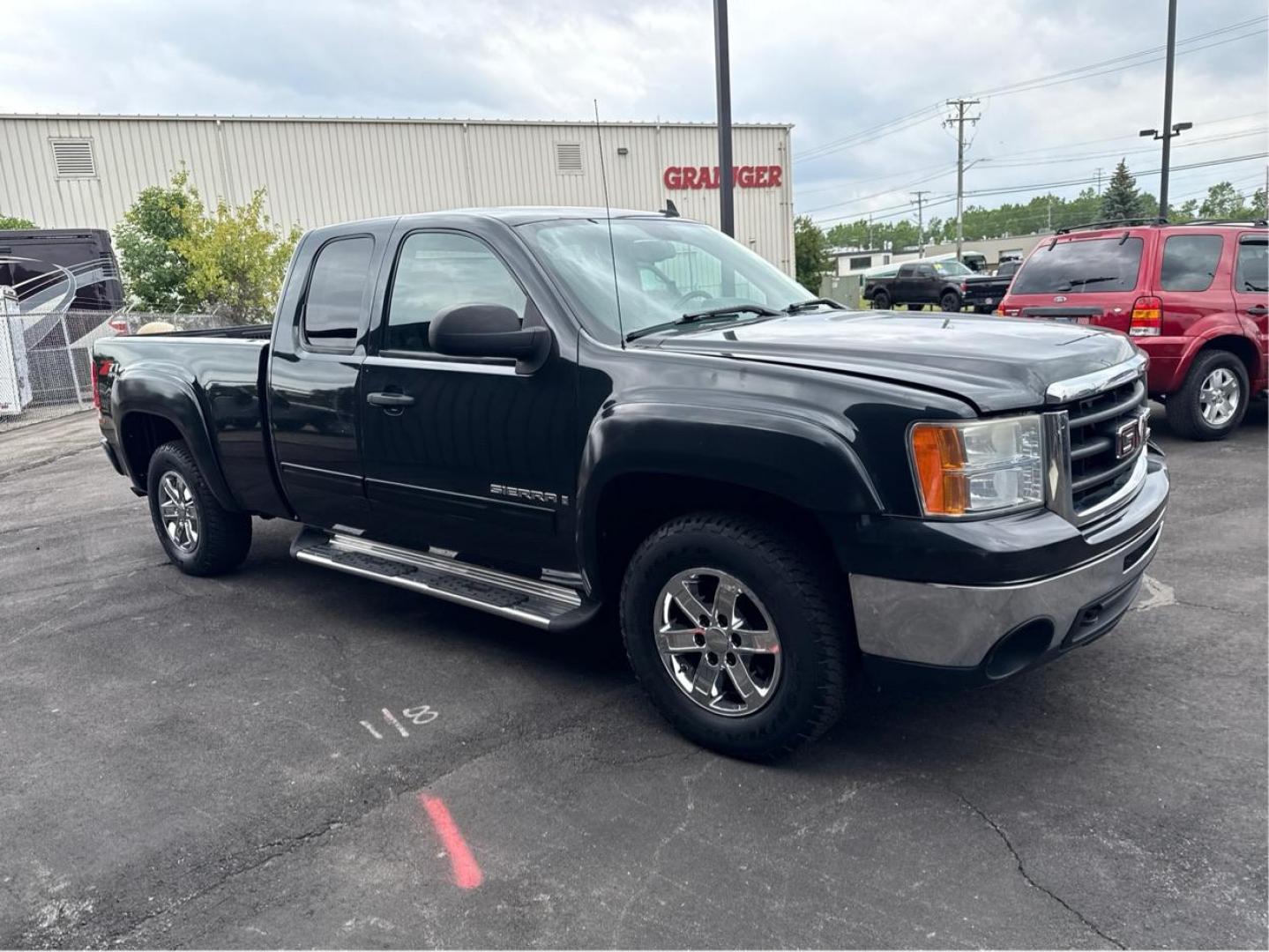 2009 BLACK GMC SIERRA 1500 (1GTEK29029Z) with an V8,5.3L(325 CID),OHV engine, AUTOMATIC transmission, located at 14600 Frazho Road, Warren, MI, 48089, (586) 776-3400, 42.485996, -82.974220 - Photo#2