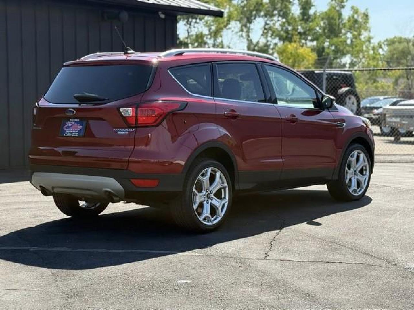2019 RUBY RED METALLIC FORD ESCAPE (1FMCU9J92KU) with an L4,2.0L(122 CID),DOHC engine, AUTOMATIC transmission, located at 14600 Frazho Road, Warren, MI, 48089, (586) 776-3400, 42.485996, -82.974220 - Photo#4