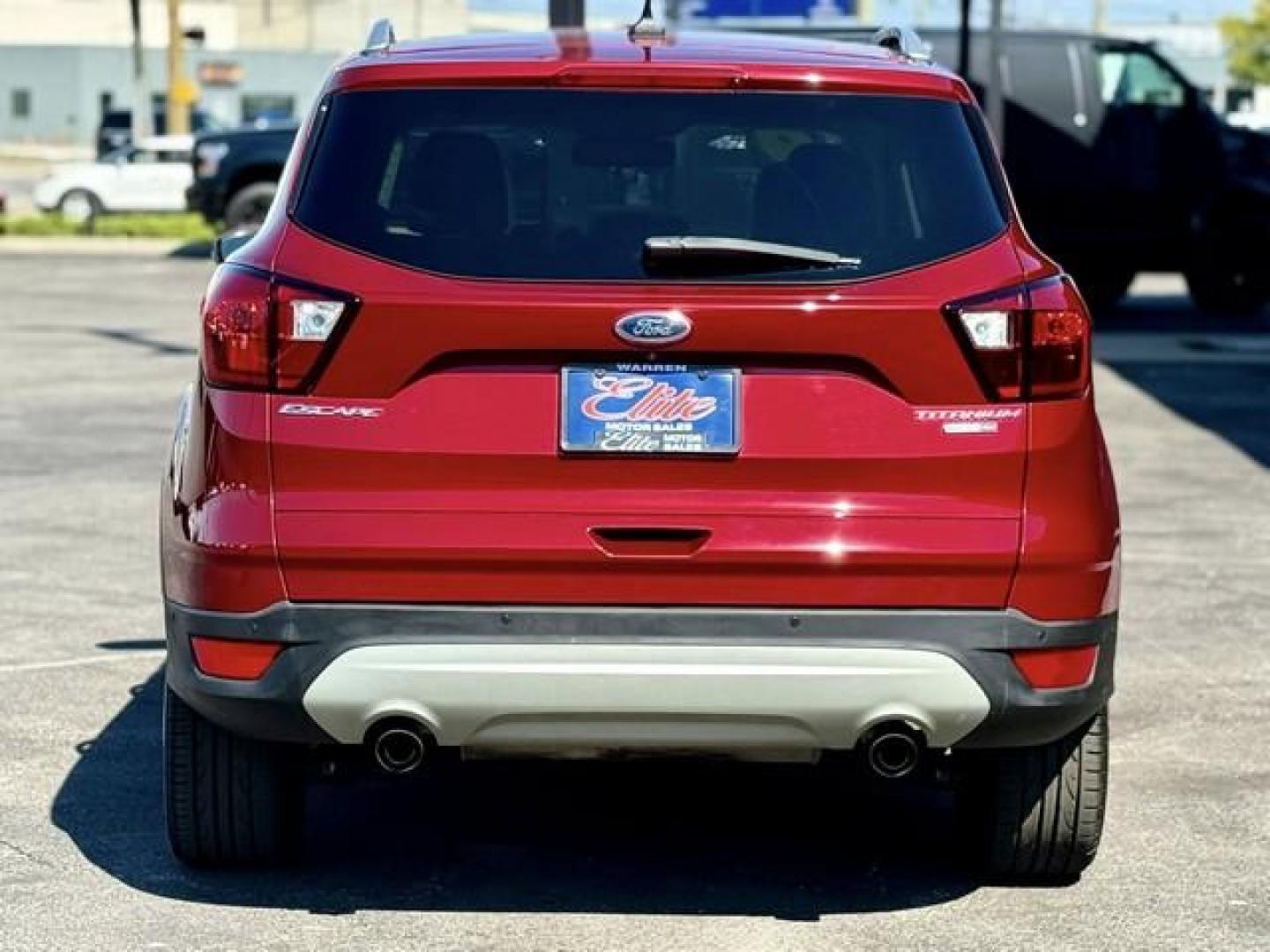 2019 RUBY RED METALLIC FORD ESCAPE (1FMCU9J92KU) with an L4,2.0L(122 CID),DOHC engine, AUTOMATIC transmission, located at 14600 Frazho Road, Warren, MI, 48089, (586) 776-3400, 42.485996, -82.974220 - Photo#5