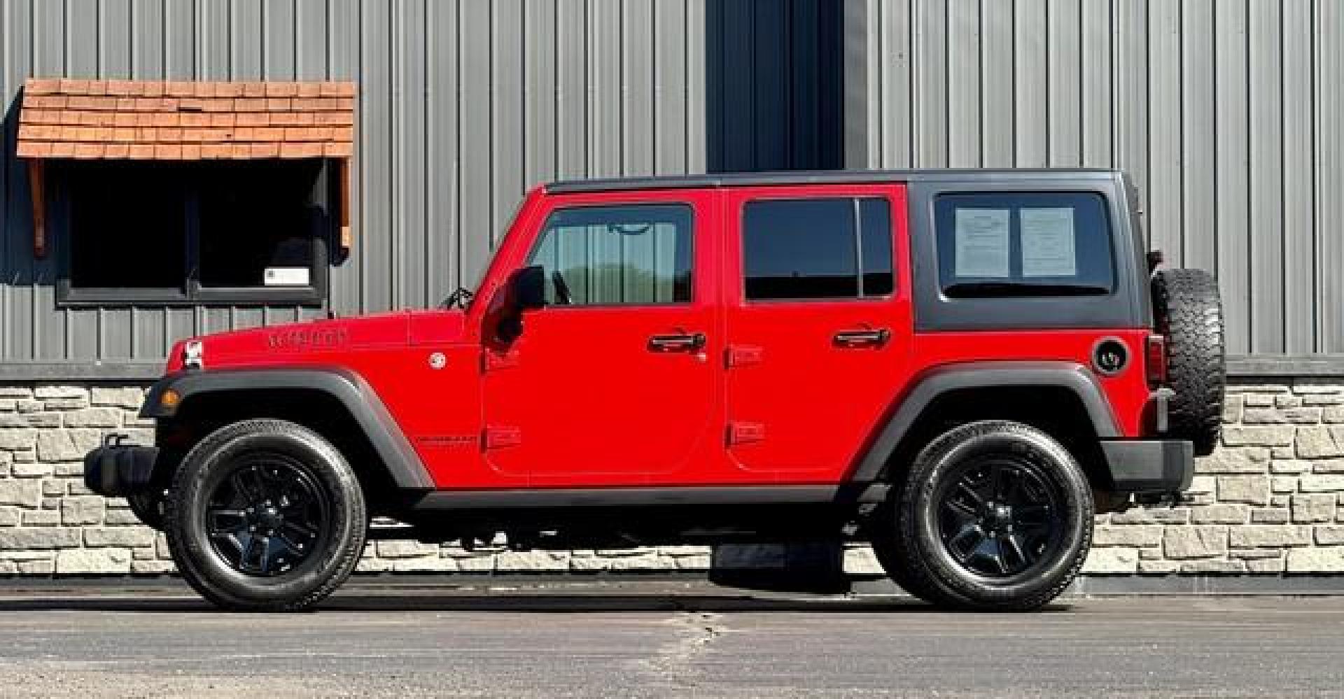2017 FIRE CRACKER RED JEEP WRANGLER (1C4BJWDG4HL) with an V6,3.6L(220 CID),DOHC engine, AUTOMATIC transmission, located at 14600 Frazho Road, Warren, MI, 48089, (586) 776-3400, 42.485996, -82.974220 - Photo#1