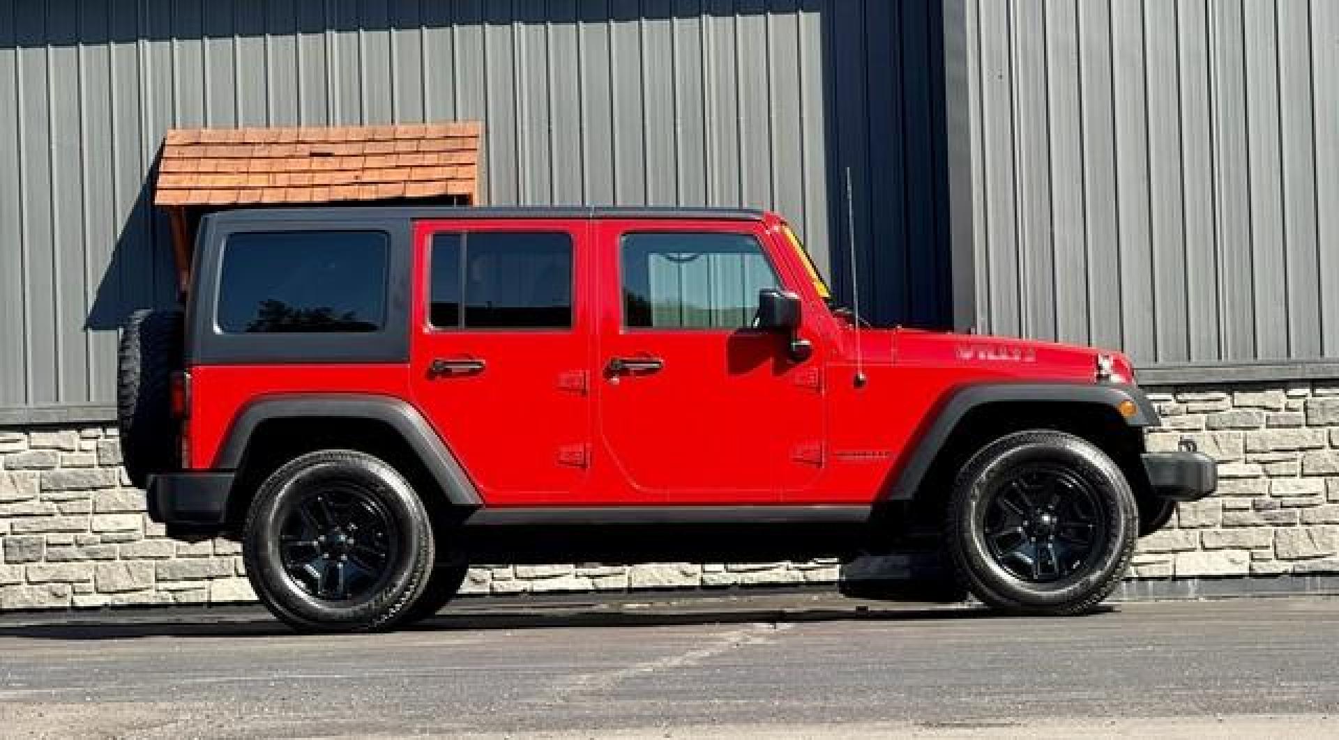 2017 FIRE CRACKER RED JEEP WRANGLER (1C4BJWDG4HL) with an V6,3.6L(220 CID),DOHC engine, AUTOMATIC transmission, located at 14600 Frazho Road, Warren, MI, 48089, (586) 776-3400, 42.485996, -82.974220 - Photo#2