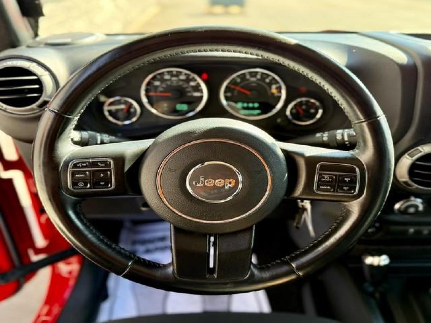 2017 FIRE CRACKER RED JEEP WRANGLER (1C4BJWDG4HL) with an V6,3.6L(220 CID),DOHC engine, AUTOMATIC transmission, located at 14600 Frazho Road, Warren, MI, 48089, (586) 776-3400, 42.485996, -82.974220 - Photo#9