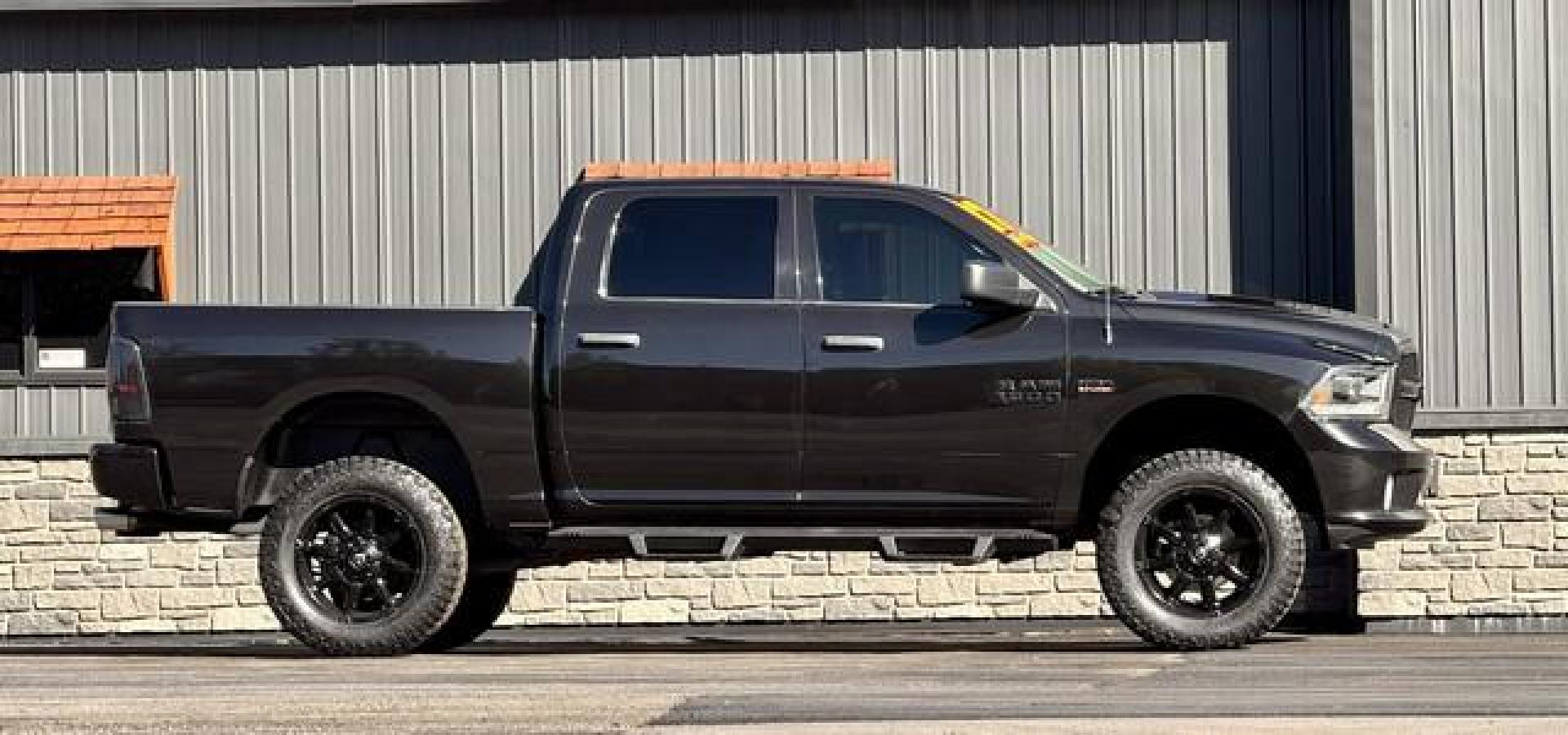2017 BLACK RAM 1500 (3C6RR7KT7HG) with an V8,5.7L(345 CID),OHV engine, AUTOMATIC transmission, located at 14600 Frazho Road, Warren, MI, 48089, (586) 776-3400, 42.485996, -82.974220 - Photo#1