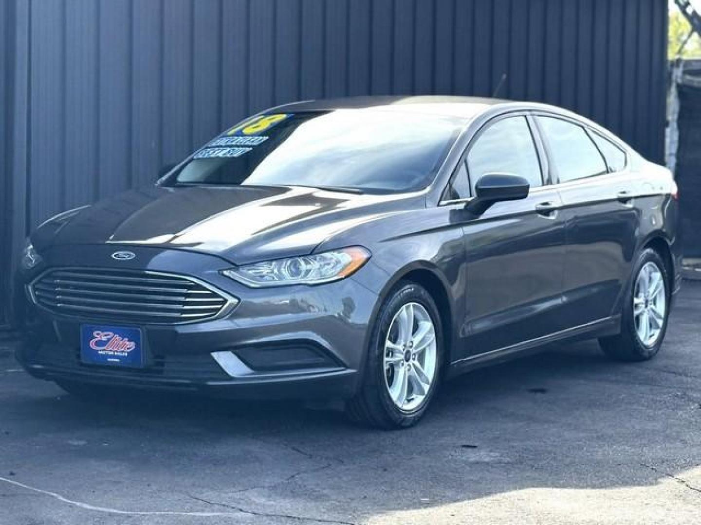 2018 GRAY FORD FUSION (3FA6P0HDXJR) with an L4,1.5L(91 CID),DOHC engine, AUTOMATIC transmission, located at 14600 Frazho Road, Warren, MI, 48089, (586) 776-3400, 42.485996, -82.974220 - Photo#1