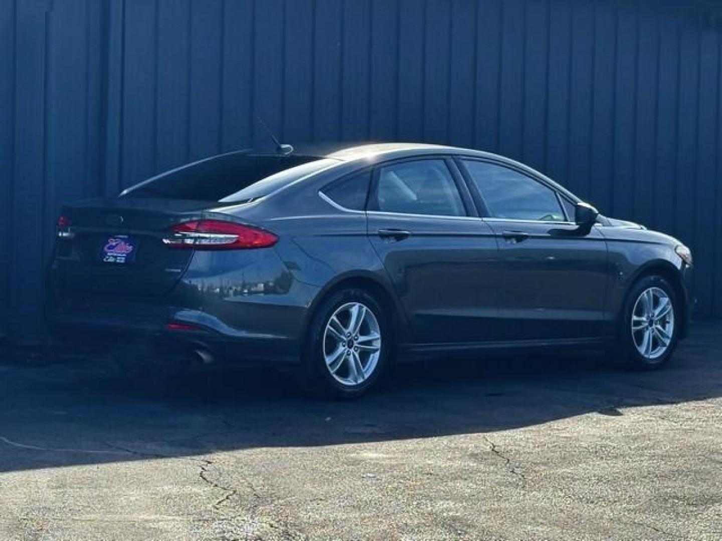 2018 GRAY FORD FUSION (3FA6P0HDXJR) with an L4,1.5L(91 CID),DOHC engine, AUTOMATIC transmission, located at 14600 Frazho Road, Warren, MI, 48089, (586) 776-3400, 42.485996, -82.974220 - Photo#5