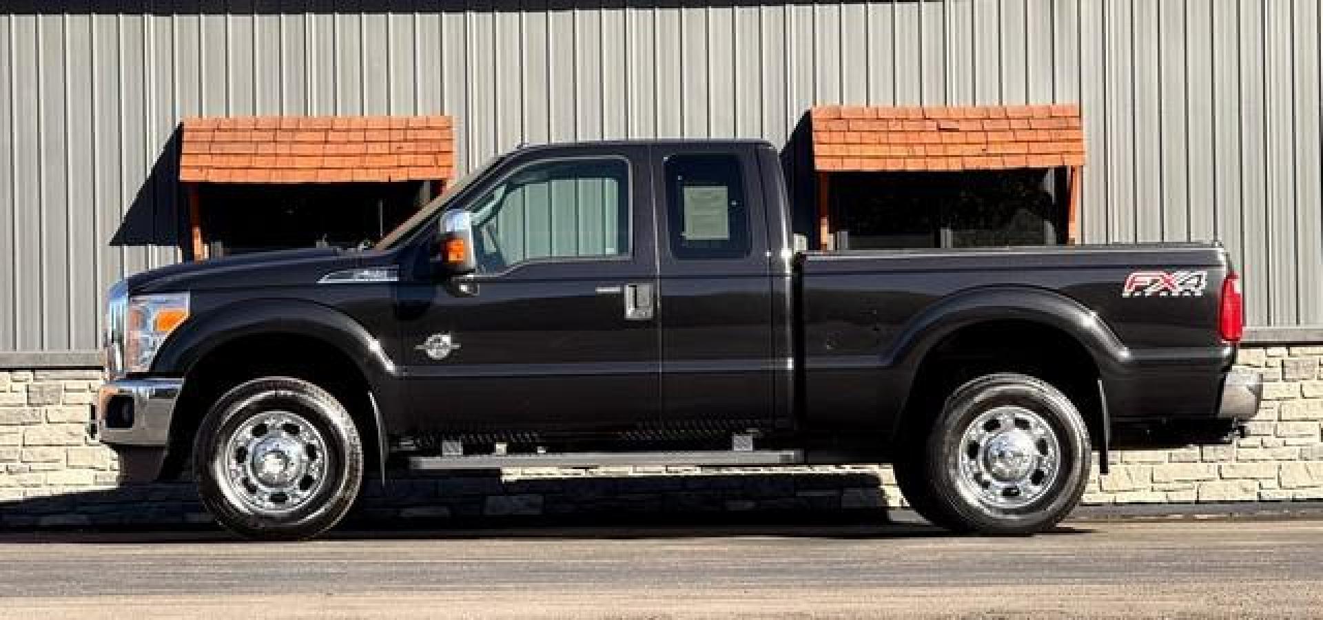 2015 BLACK FORD F-250 SUPER DUTY (1FT7X2BT6FE) with an V8,6.7L(406 CID),OHV engine, AUTOMATIC transmission, located at 14600 Frazho Road, Warren, MI, 48089, (586) 776-3400, 42.485996, -82.974220 - Photo#1