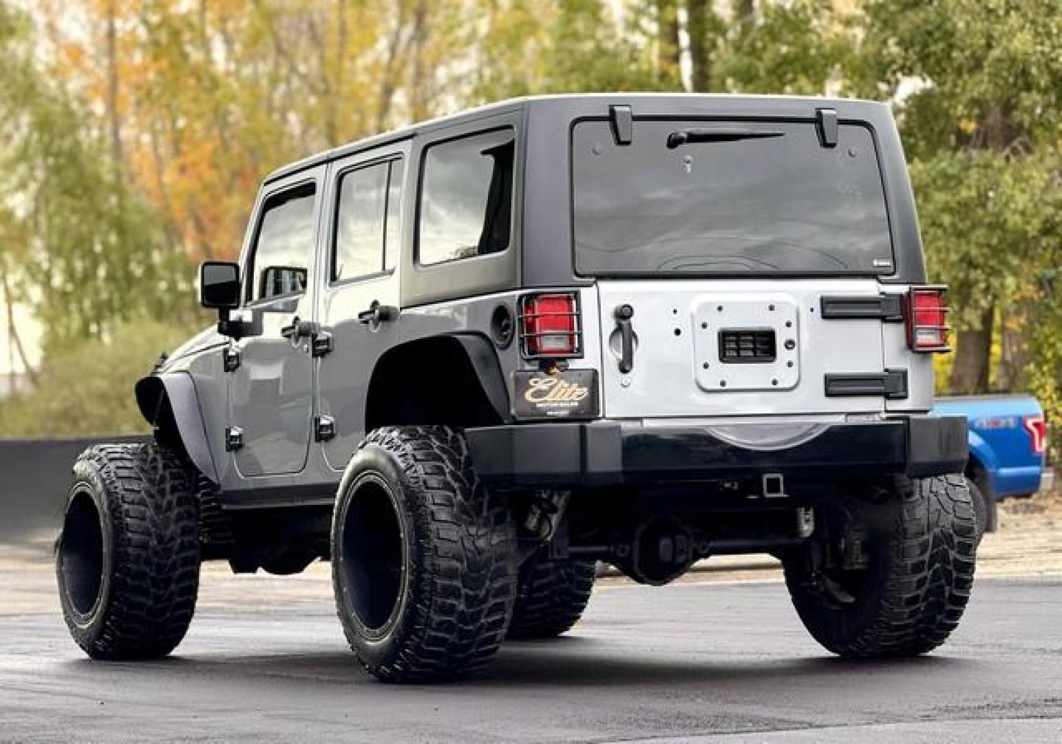 2014 SILVER JEEP WRANGLER (1C4BJWEG1EL) with an V6,3.6L(220 CID),DOHC engine, AUTOMATIC transmission, located at 14600 Frazho Road, Warren, MI, 48089, (586) 776-3400, 42.485996, -82.974220 - Photo#5