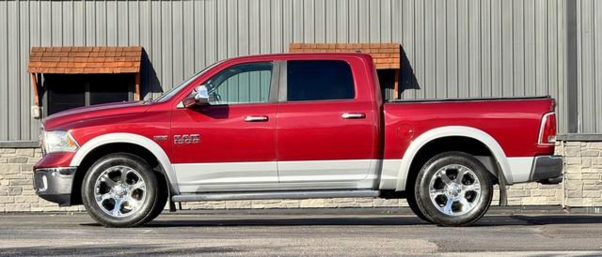 2015 MAROON RAM 1500 LARAMIE (1C6RR7NT4FS) with an V8,5.7L(345 CID),OHV engine, AUTOMATIC transmission, located at 14600 Frazho Road, Warren, MI, 48089, (586) 776-3400, 42.485996, -82.974220 - Photo#0