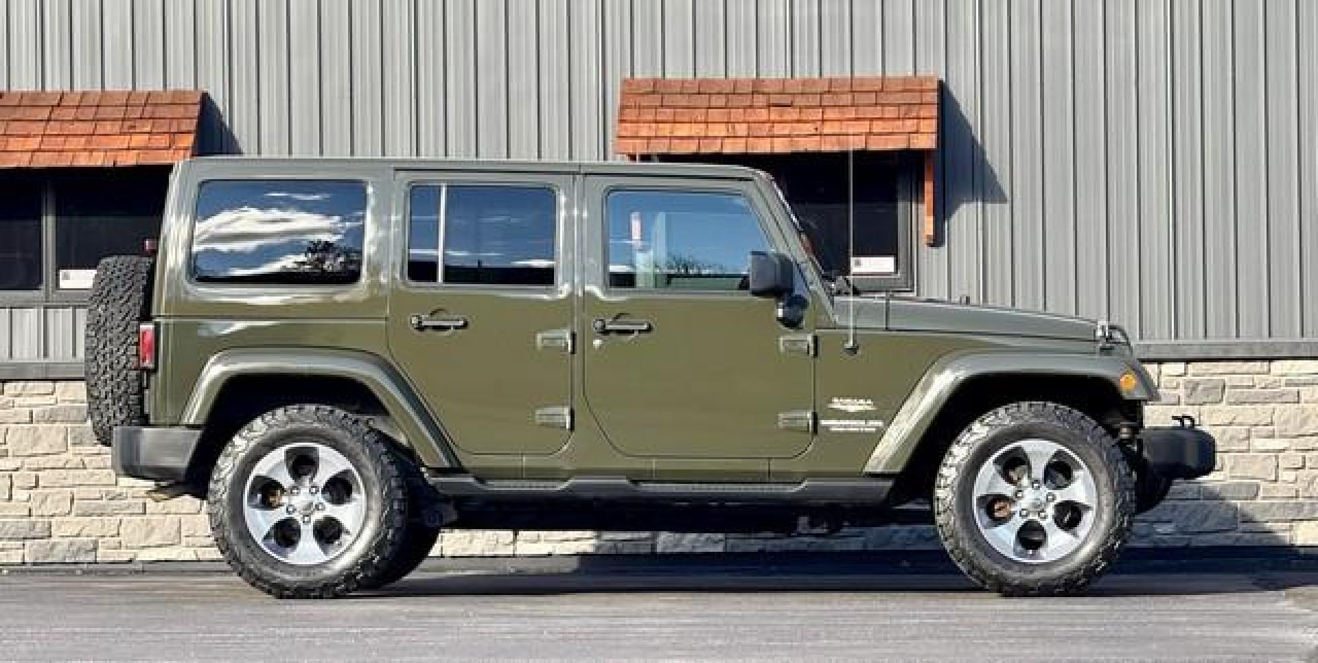 2015 GREEN JEEP WRANGLER (1C4BJWEG7FL) with an V6,3.6L(220 CID),DOHC engine, AUTOMATIC transmission, located at 14600 Frazho Road, Warren, MI, 48089, (586) 776-3400, 42.485996, -82.974220 - Photo#2