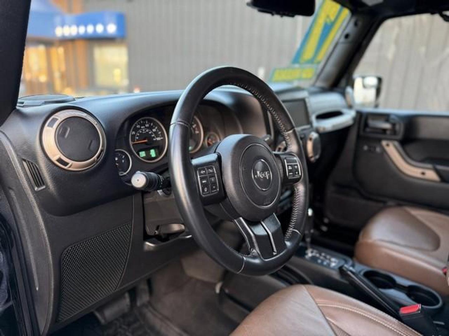 2017 BLACK JEEP WRANGLER (1C4BJWEG6HL) with an V6,3.6L(220 CID),DOHC engine, AUTOMATIC transmission, located at 14600 Frazho Road, Warren, MI, 48089, (586) 776-3400, 42.485996, -82.974220 - Photo#9