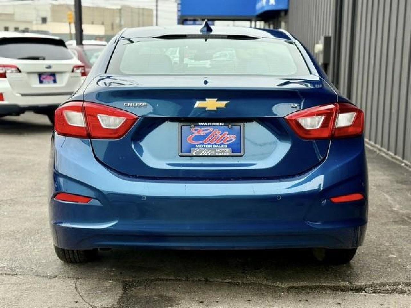 2019 BLUE CHEVROLET CRUZE (1G1BE5SM8K7) with an L4,1.4L(85 CID),DOHC engine, AUTOMATIC transmission, located at 14600 Frazho Road, Warren, MI, 48089, (586) 776-3400, 42.485996, -82.974220 - Photo#4