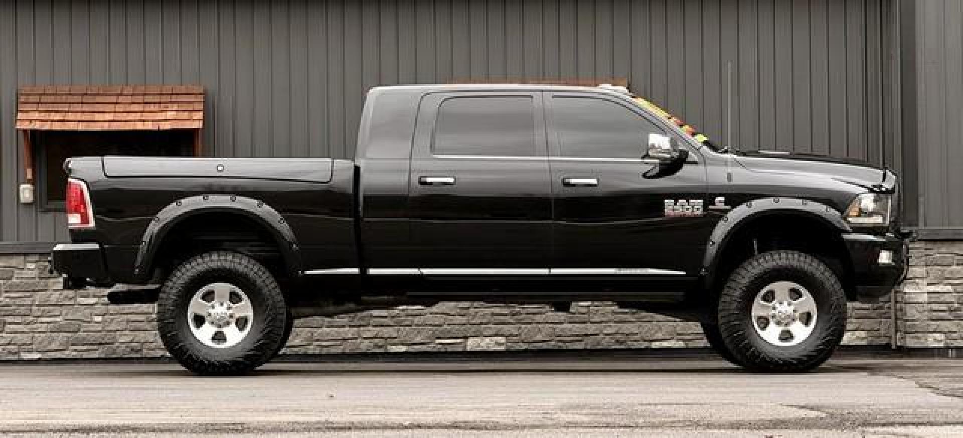 2017 BLACK RAM 2500 (3C6UR5PL7HG) with an L6,6.7L(408 CID),OHV engine, AUTOMATIC transmission, located at 14600 Frazho Road, Warren, MI, 48089, (586) 776-3400, 42.485996, -82.974220 - Photo#1