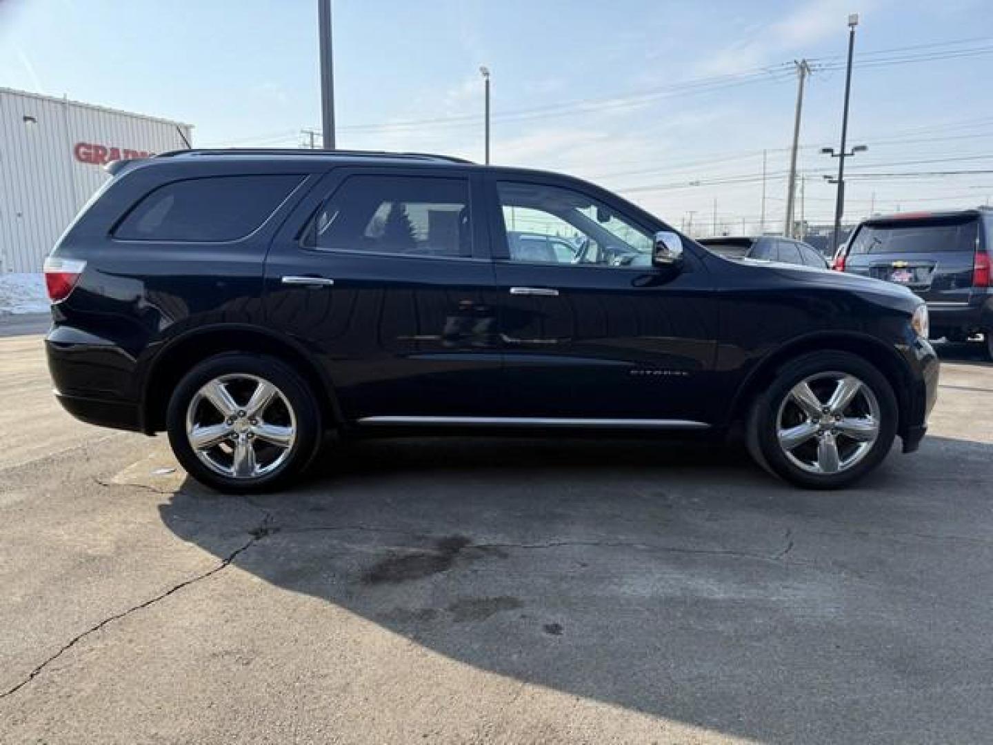 2012 BLACK DODGE DURANGO (1C4RDJEG5CC) with an V6,3.6L(220 CID),DOHC engine, AUTOMATIC transmission, located at 14600 Frazho Road, Warren, MI, 48089, (586) 776-3400, 42.485996, -82.974220 - Photo#4