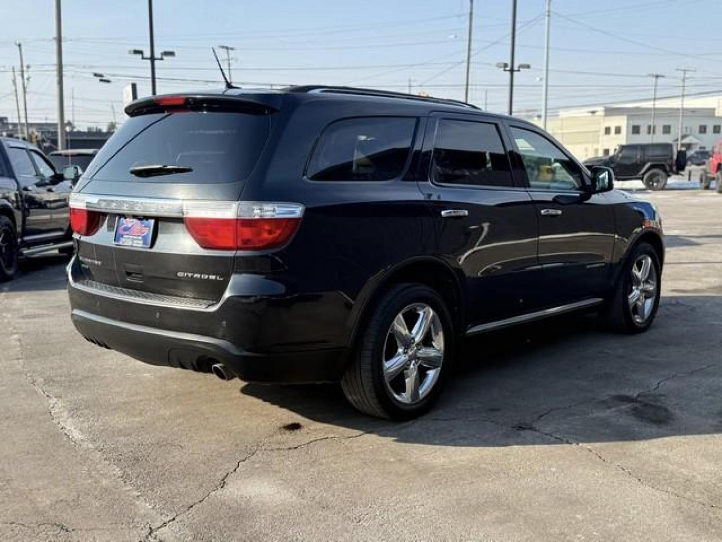 2012 BLACK DODGE DURANGO (1C4RDJEG5CC) with an V6,3.6L(220 CID),DOHC engine, AUTOMATIC transmission, located at 14600 Frazho Road, Warren, MI, 48089, (586) 776-3400, 42.485996, -82.974220 - Photo#5