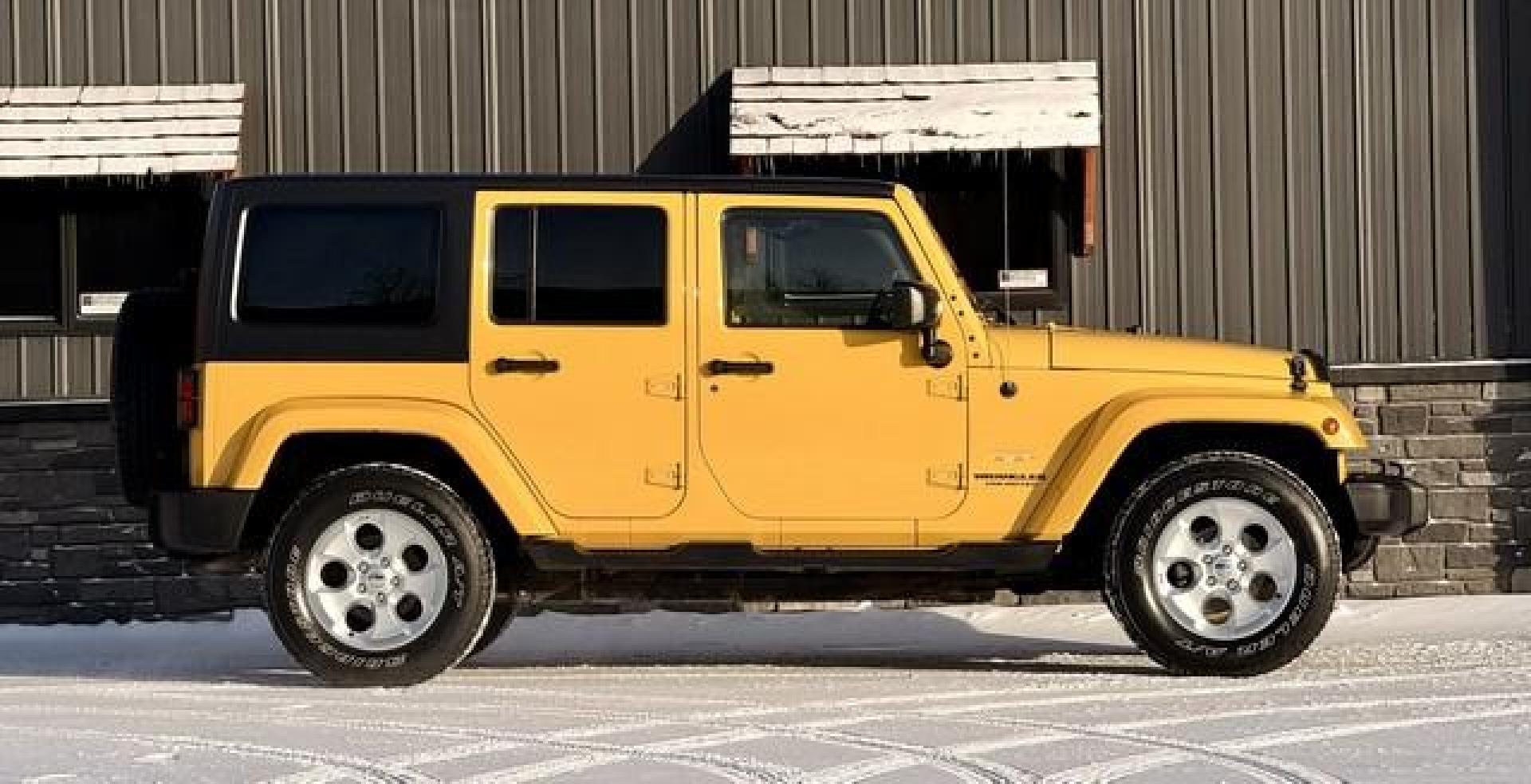 2015 YELLOW JEEP WRANGLER (1C4BJWEGXFL) with an V6,3.6L(220 CID),DOHC engine, AUTOMATIC transmission, located at 14600 Frazho Road, Warren, MI, 48089, (586) 776-3400, 42.485996, -82.974220 - Photo#1