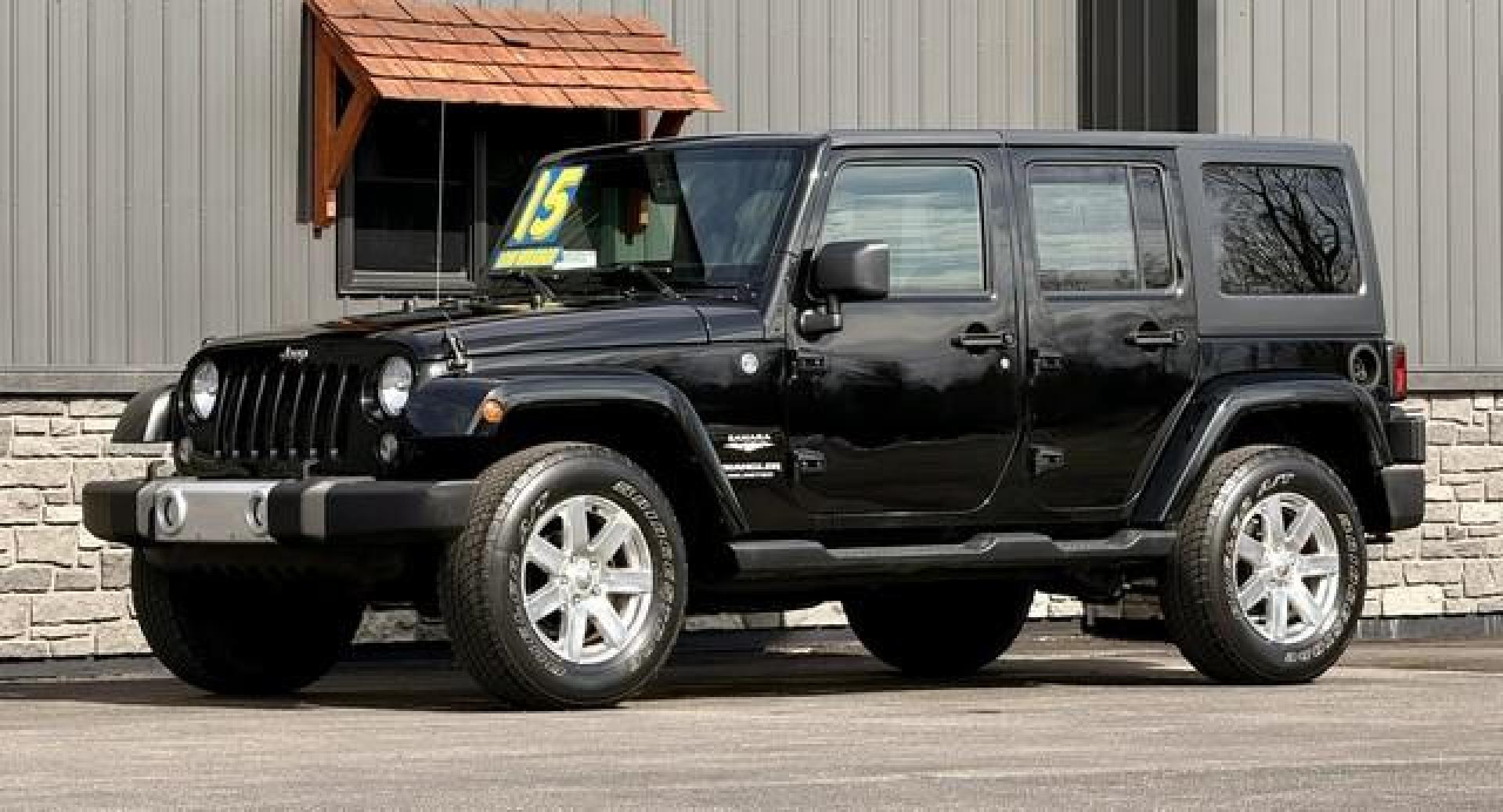 2015 BLACK JEEP WRANGLER (1C4BJWEG2FL) with an V6,3.6L(220 CID),DOHC engine, AUTOMATIC transmission, located at 14600 Frazho Road, Warren, MI, 48089, (586) 776-3400, 42.485996, -82.974220 - Photo#1