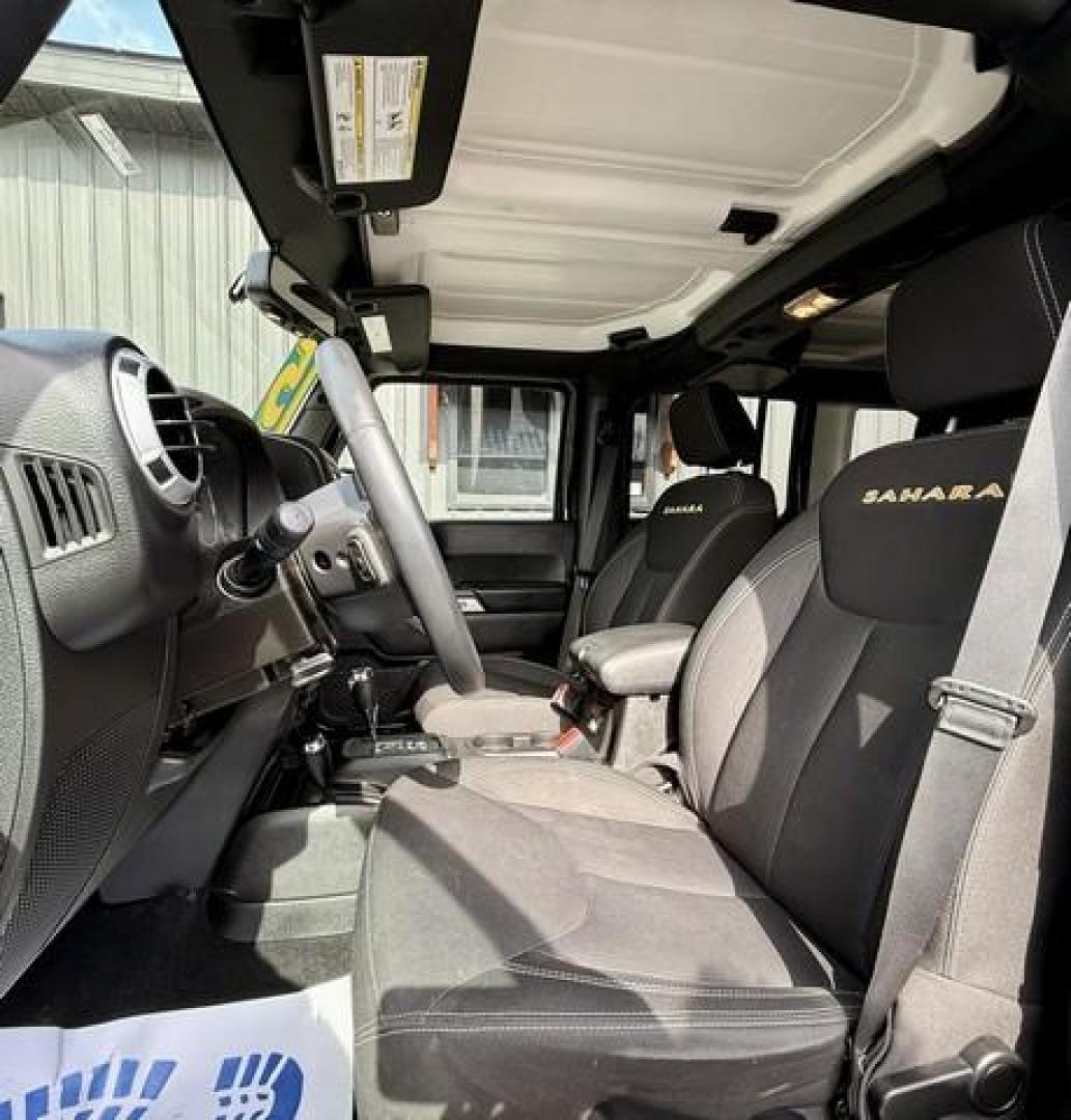 2015 BLACK JEEP WRANGLER (1C4BJWEG2FL) with an V6,3.6L(220 CID),DOHC engine, AUTOMATIC transmission, located at 14600 Frazho Road, Warren, MI, 48089, (586) 776-3400, 42.485996, -82.974220 - Photo#6