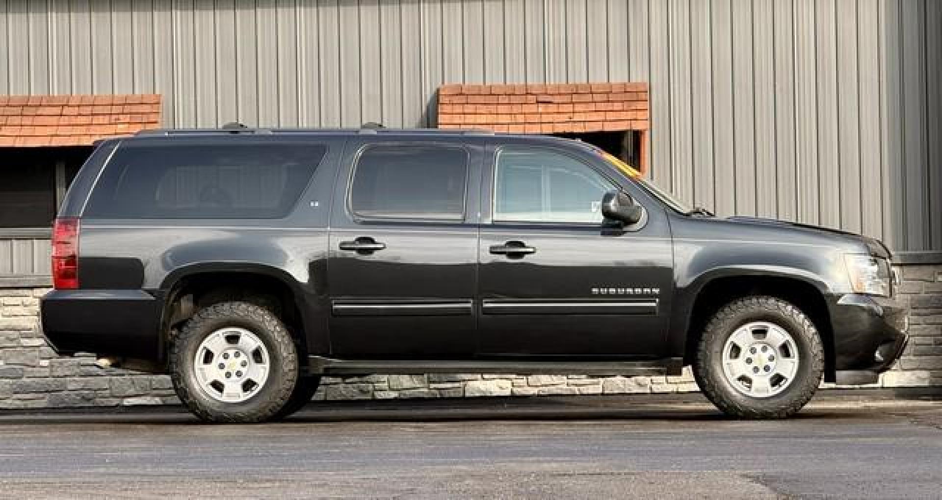 2012 BLACK CHEVROLET SUBURBAN 1500 (1GNSKJE74CR) with an V8,5.3L(325 CID),OHV engine, AUTOMATIC transmission, located at 14600 Frazho Road, Warren, MI, 48089, (586) 776-3400, 42.485996, -82.974220 - Photo#1