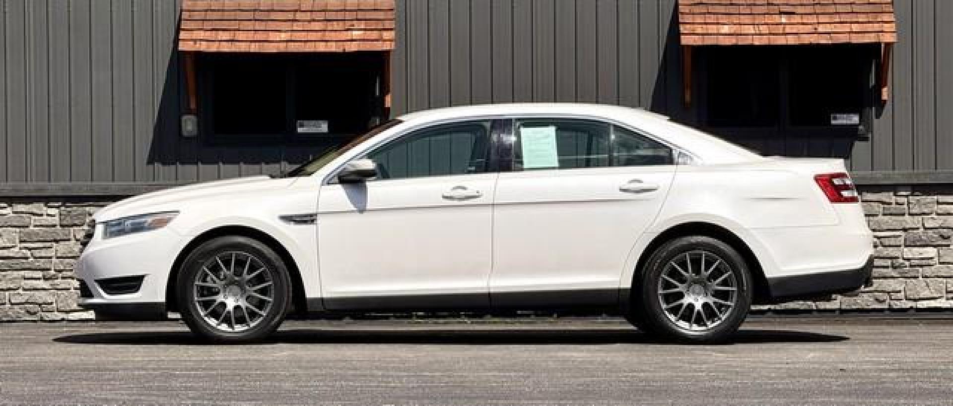 2013 WHITE PLATINUM FORD TAURUS (1FAHP2E86DG) with an V6,3.5L(213 CID),DOHC engine, AUTOMATIC transmission, located at 14600 Frazho Road, Warren, MI, 48089, (586) 776-3400, 42.485996, -82.974220 - Photo#0