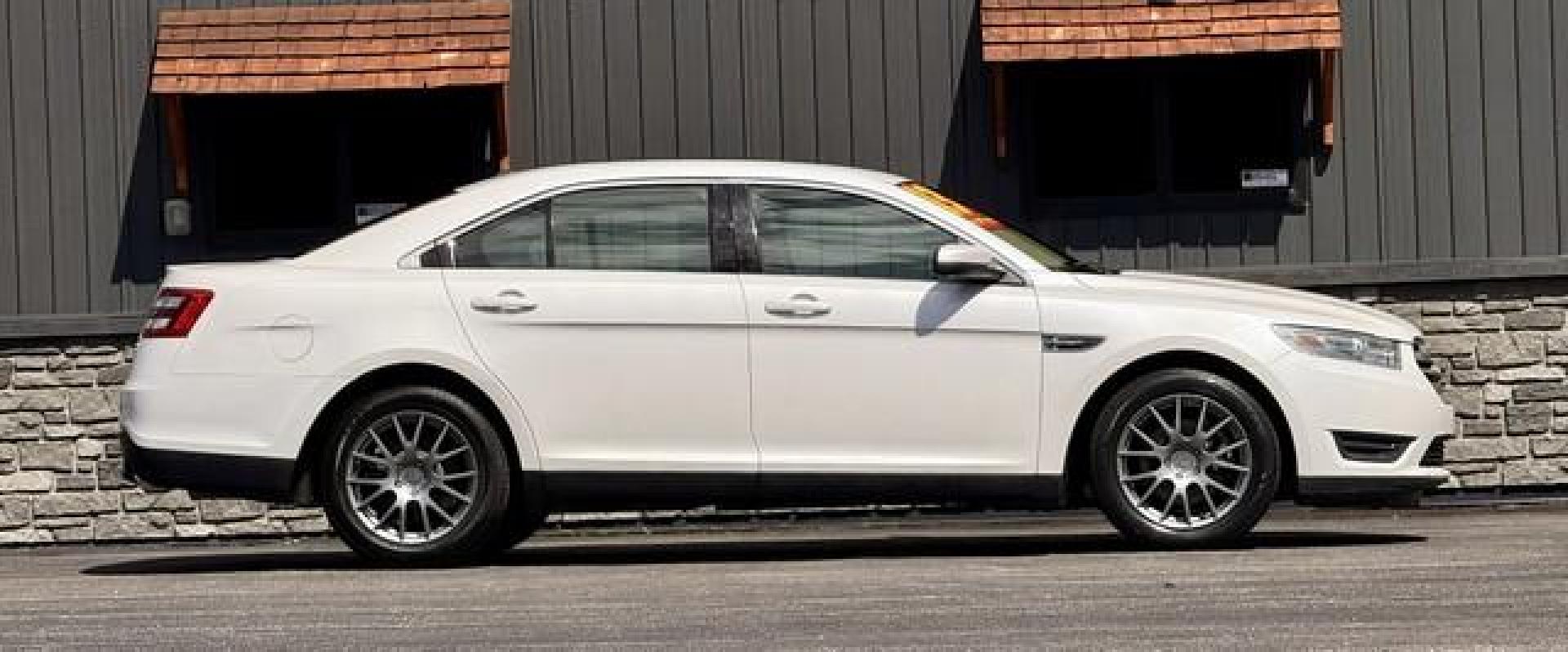 2013 WHITE PLATINUM FORD TAURUS (1FAHP2E86DG) with an V6,3.5L(213 CID),DOHC engine, AUTOMATIC transmission, located at 14600 Frazho Road, Warren, MI, 48089, (586) 776-3400, 42.485996, -82.974220 - Photo#3