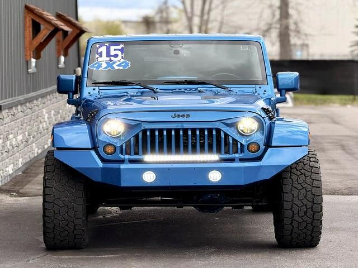 2015 HYDRO BLUE JEEP WRANGLER (1C4BJWEG0FL) with an V6,3.6L(220 CID),DOHC engine, AUTOMATIC transmission, located at 14600 Frazho Road, Warren, MI, 48089, (586) 776-3400, 42.485996, -82.974220 - Photo#1