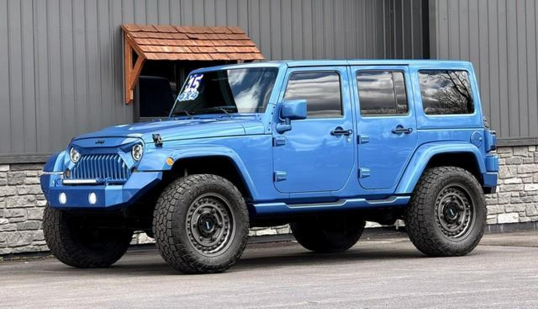 2015 HYDRO BLUE JEEP WRANGLER (1C4BJWEG0FL) with an V6,3.6L(220 CID),DOHC engine, AUTOMATIC transmission, located at 14600 Frazho Road, Warren, MI, 48089, (586) 776-3400, 42.485996, -82.974220 - Photo#2