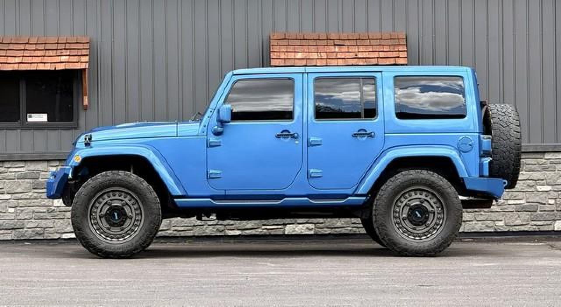 2015 HYDRO BLUE JEEP WRANGLER (1C4BJWEG0FL) with an V6,3.6L(220 CID),DOHC engine, AUTOMATIC transmission, located at 14600 Frazho Road, Warren, MI, 48089, (586) 776-3400, 42.485996, -82.974220 - Photo#3