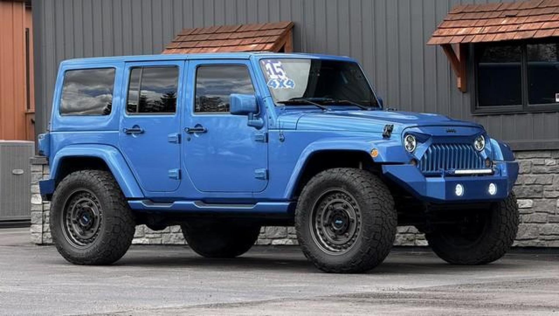 2015 HYDRO BLUE JEEP WRANGLER (1C4BJWEG0FL) with an V6,3.6L(220 CID),DOHC engine, AUTOMATIC transmission, located at 14600 Frazho Road, Warren, MI, 48089, (586) 776-3400, 42.485996, -82.974220 - Photo#4