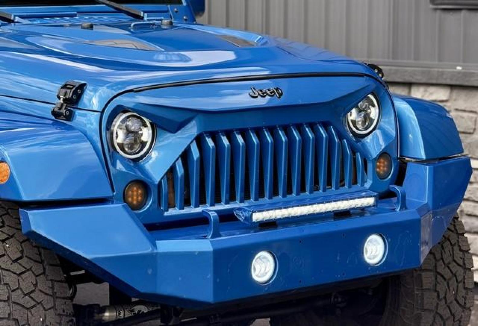 2015 HYDRO BLUE JEEP WRANGLER (1C4BJWEG0FL) with an V6,3.6L(220 CID),DOHC engine, AUTOMATIC transmission, located at 14600 Frazho Road, Warren, MI, 48089, (586) 776-3400, 42.485996, -82.974220 - Photo#6