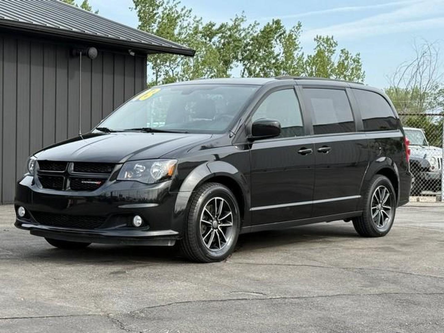 2018 BLACK DODGE GRAND CARAVAN (2C4RDGEG4JR) with an V6,3.6L(220 CID),DOHC engine, AUTOMATIC transmission, located at 14600 Frazho Road, Warren, MI, 48089, (586) 776-3400, 42.485996, -82.974220 - Photo#1