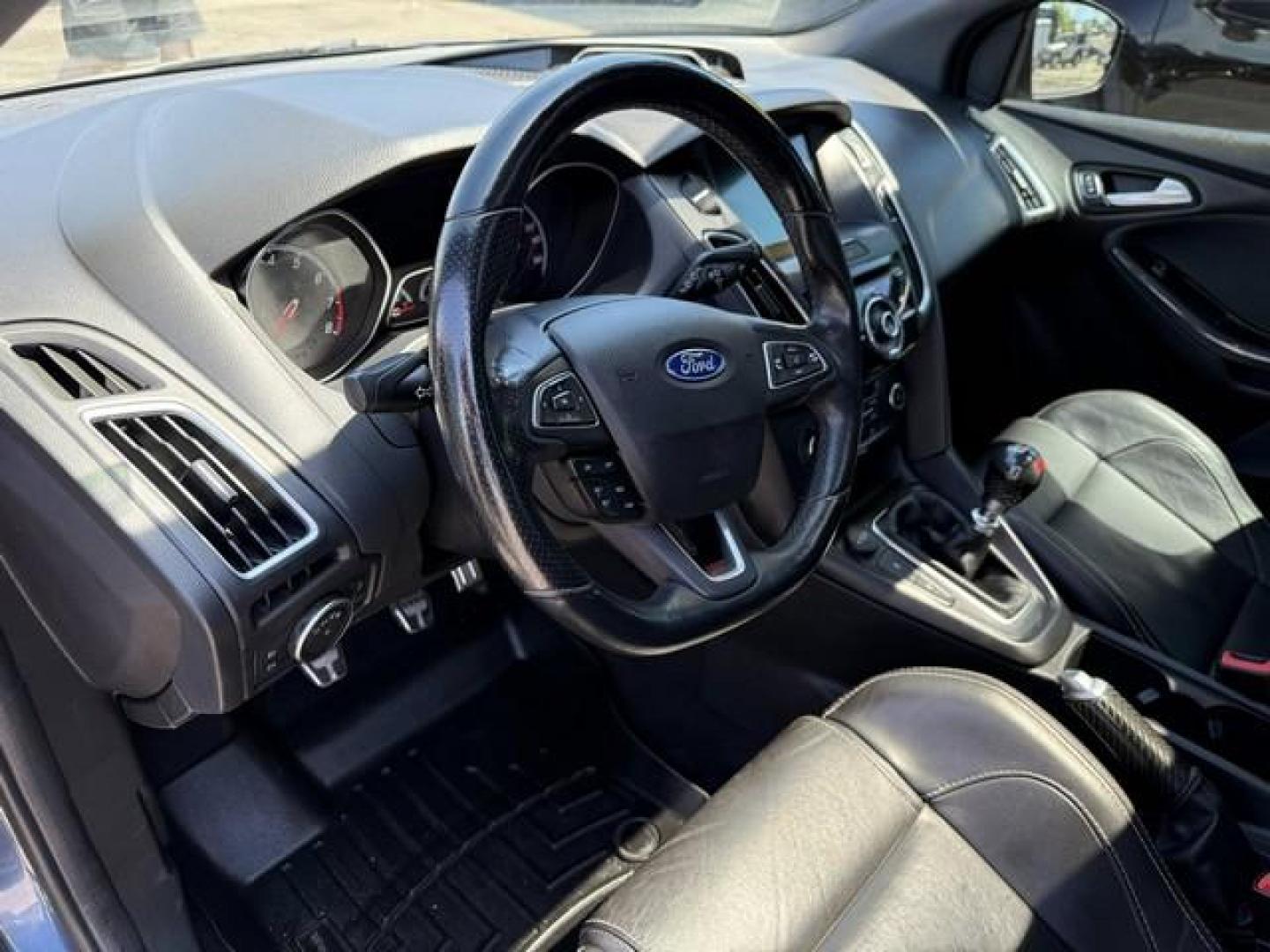 2018 BLUE FORD FOCUS (1FADP3L98JL) with an L4,2.0L(122 CID),DOHC engine, MANUAL transmission, located at 14600 Frazho Road, Warren, MI, 48089, (586) 776-3400, 42.485996, -82.974220 - Photo#9