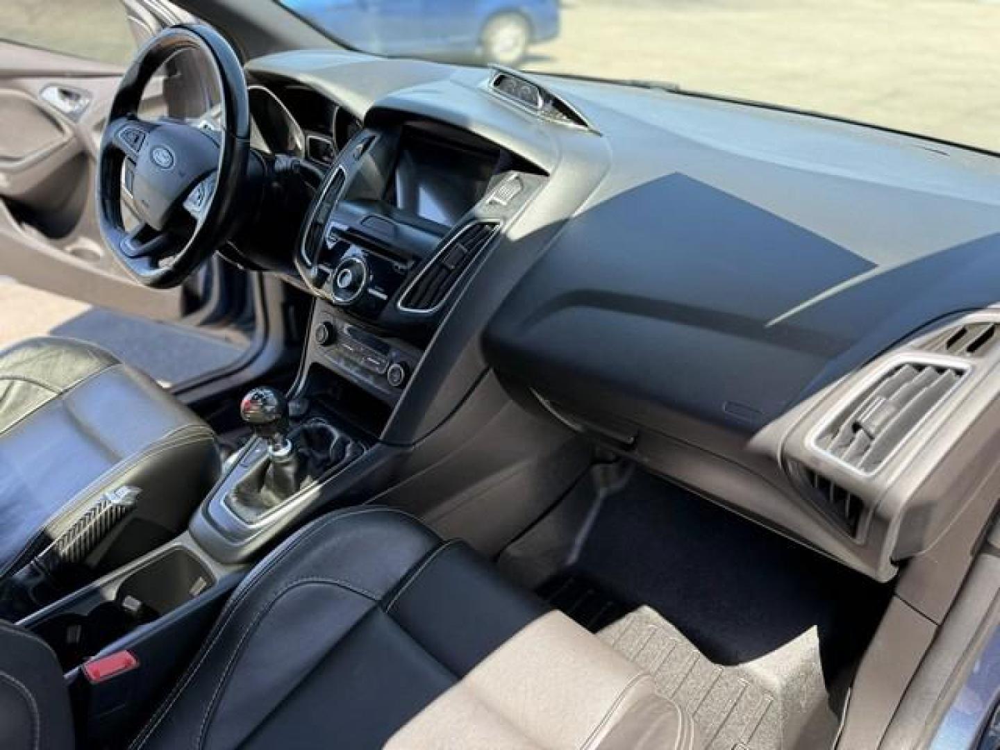 2018 BLUE FORD FOCUS (1FADP3L98JL) with an L4,2.0L(122 CID),DOHC engine, MANUAL transmission, located at 14600 Frazho Road, Warren, MI, 48089, (586) 776-3400, 42.485996, -82.974220 - Photo#15