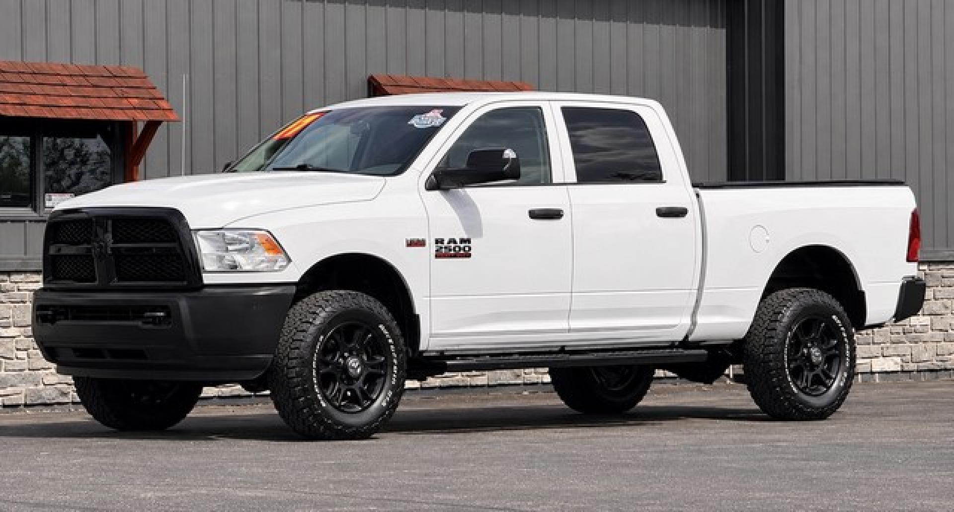 2014 WHITE RAM 2500 (3C6TR5CT0EG) with an V8,5.7L(345 CID),OHV engine, AUTOMATIC transmission, located at 14600 Frazho Road, Warren, MI, 48089, (586) 776-3400, 42.485996, -82.974220- Photo#1