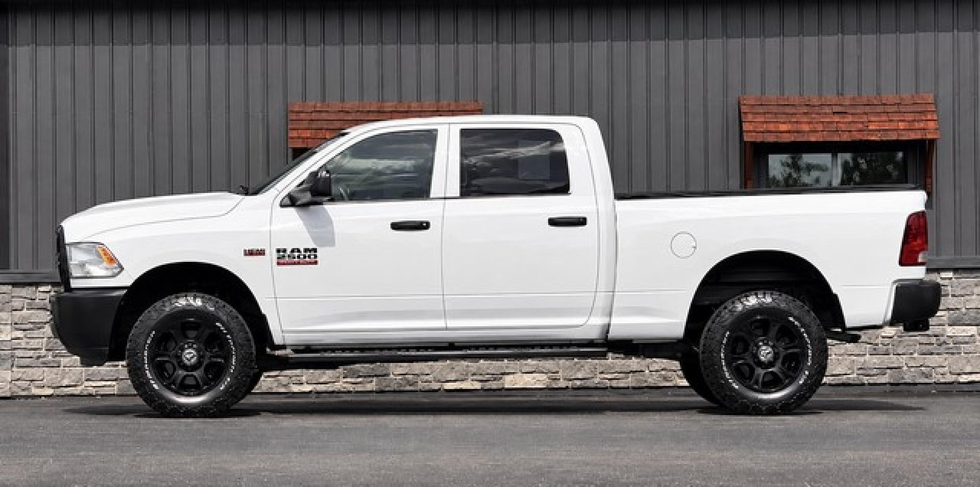 2014 WHITE RAM 2500 (3C6TR5CT0EG) with an V8,5.7L(345 CID),OHV engine, AUTOMATIC transmission, located at 14600 Frazho Road, Warren, MI, 48089, (586) 776-3400, 42.485996, -82.974220- Photo#2