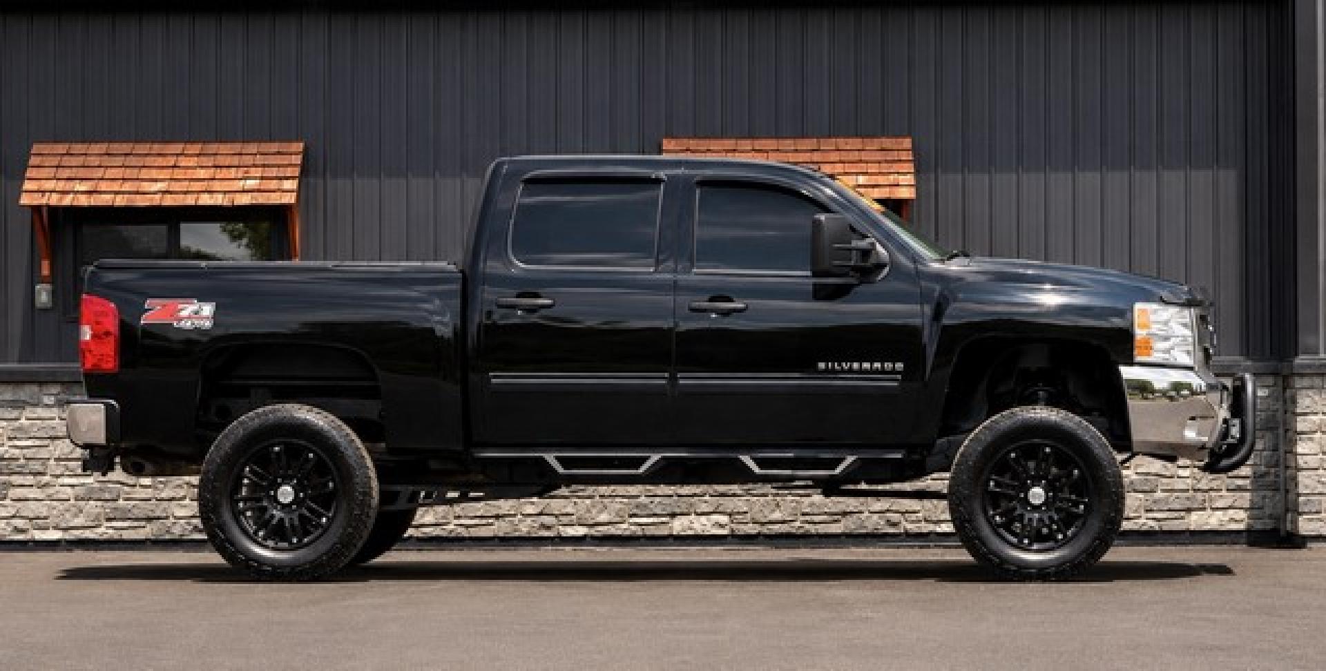 2012 BLACK CHEVROLET SILVERADO 1500 (1GCPKSE71CF) with an V8,5.3L(325 CID),OHV engine, AUTOMATIC transmission, located at 14600 Frazho Road, Warren, MI, 48089, (586) 776-3400, 42.485996, -82.974220- Photo#2