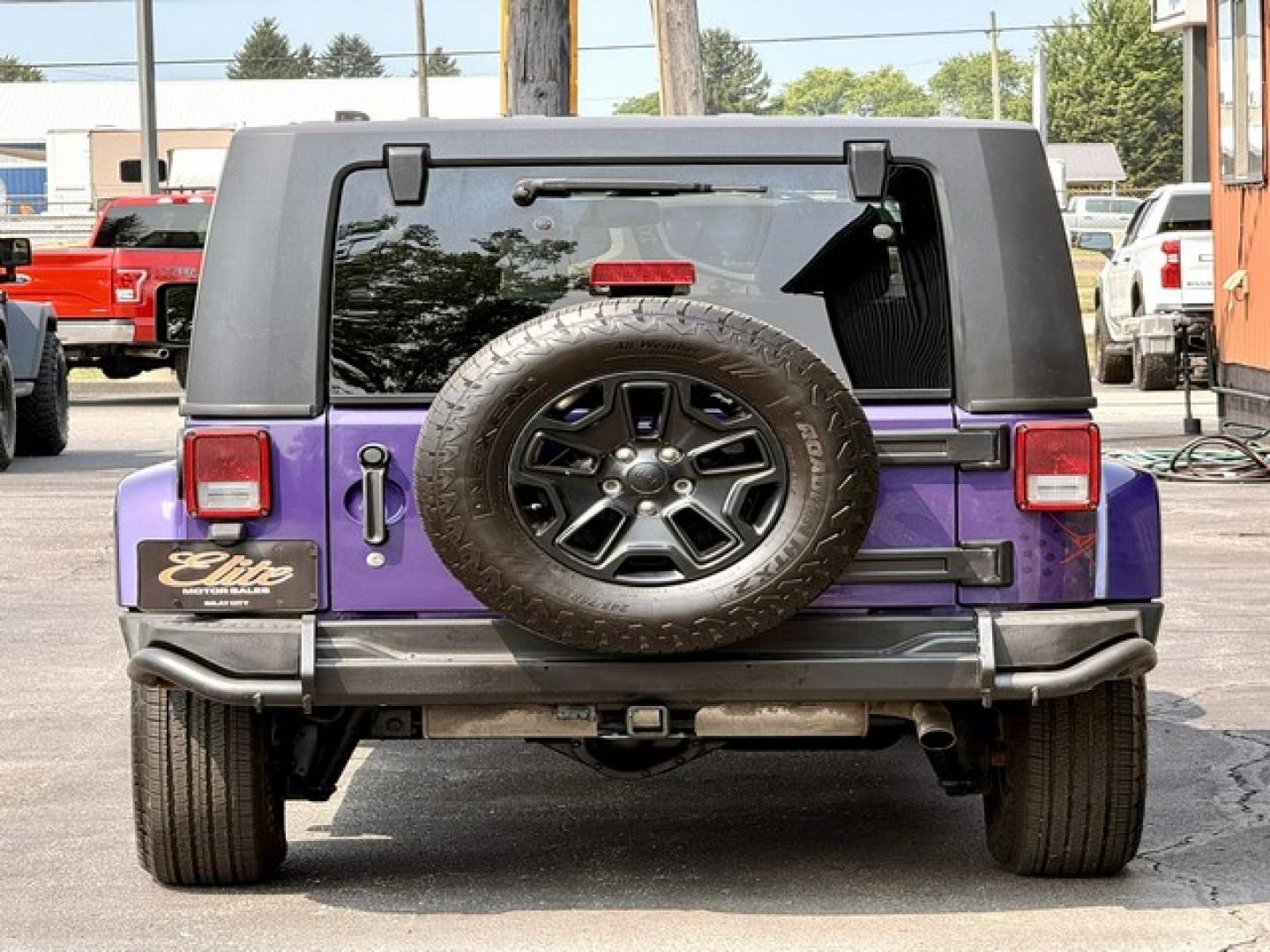 2016 PURPLE JEEP WRANGLER (1C4BJWEG4GL) with an V6,3.6L(220 CID),DOHC engine, AUTOMATIC transmission, located at 14600 Frazho Road, Warren, MI, 48089, (586) 776-3400, 42.485996, -82.974220- Photo#5