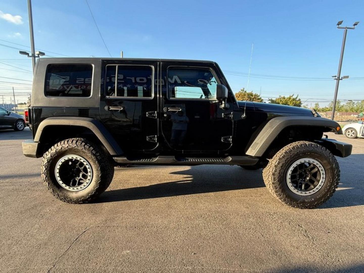 2010 BLACK JEEP WRANGLER (1J4BA3H15AL) with an V6,3.8L(231 CID),OHV engine, AUTOMATIC transmission, located at 14600 Frazho Road, Warren, MI, 48089, (586) 776-3400, 42.485996, -82.974220- Photo#4
