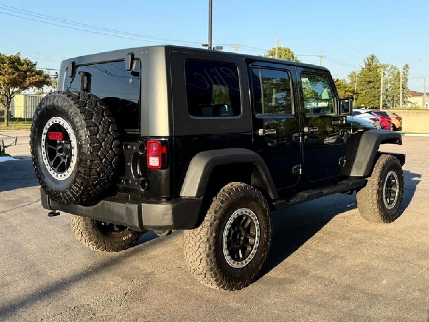2010 BLACK JEEP WRANGLER (1J4BA3H15AL) with an V6,3.8L(231 CID),OHV engine, AUTOMATIC transmission, located at 14600 Frazho Road, Warren, MI, 48089, (586) 776-3400, 42.485996, -82.974220- Photo#5