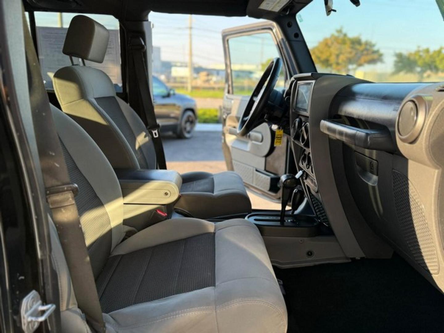 2010 BLACK JEEP WRANGLER (1J4BA3H15AL) with an V6,3.8L(231 CID),OHV engine, AUTOMATIC transmission, located at 14600 Frazho Road, Warren, MI, 48089, (586) 776-3400, 42.485996, -82.974220- Photo#12